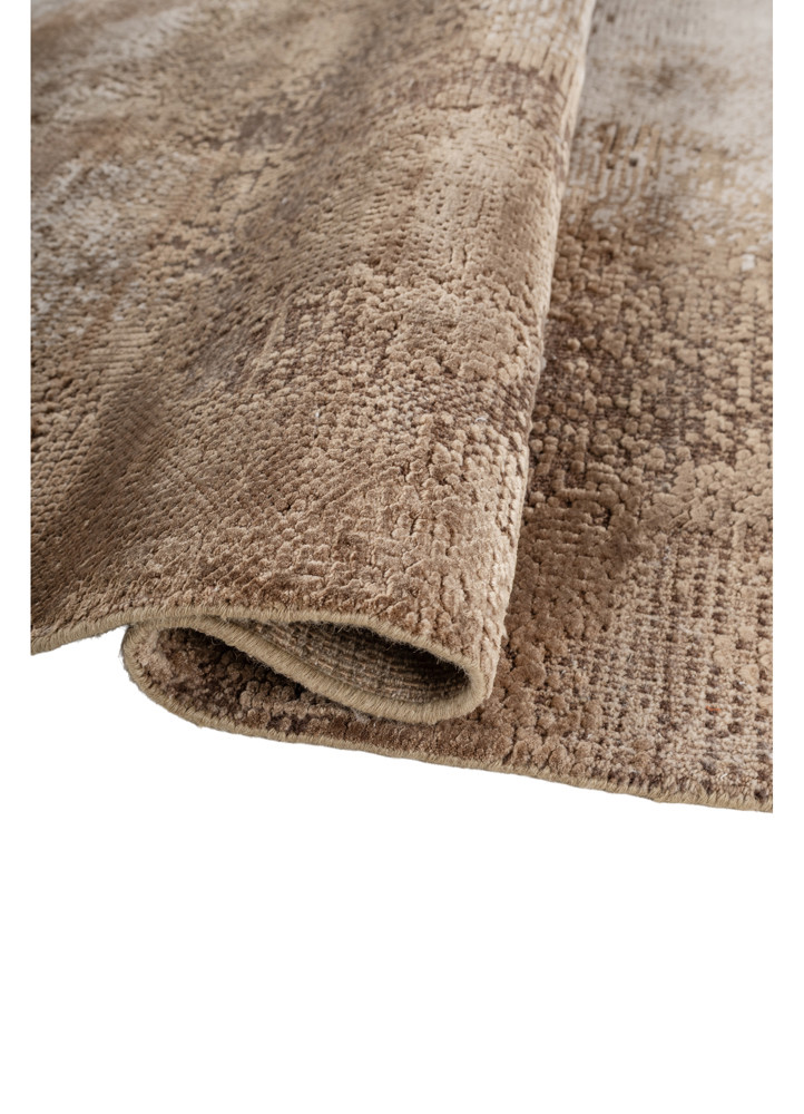 uvenuti ivory wool and bamboo silk hand knotted Rug - FoldShot uvenuti ivory wool and bamboo silk hand knotted Rug - FoldShot