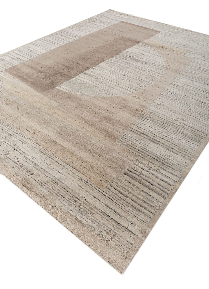 aakar by kavi ivory afghan wool and bamboo silk hand knotted Rug - FoldShot aakar by kavi ivory afghan wool and bamboo silk hand knotted Rug - FoldShot