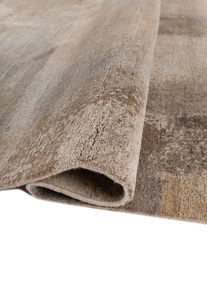 aprezo ivory wool and bamboo silk hand knotted Rug - FoldShot aprezo ivory wool and bamboo silk hand knotted Rug - FoldShot