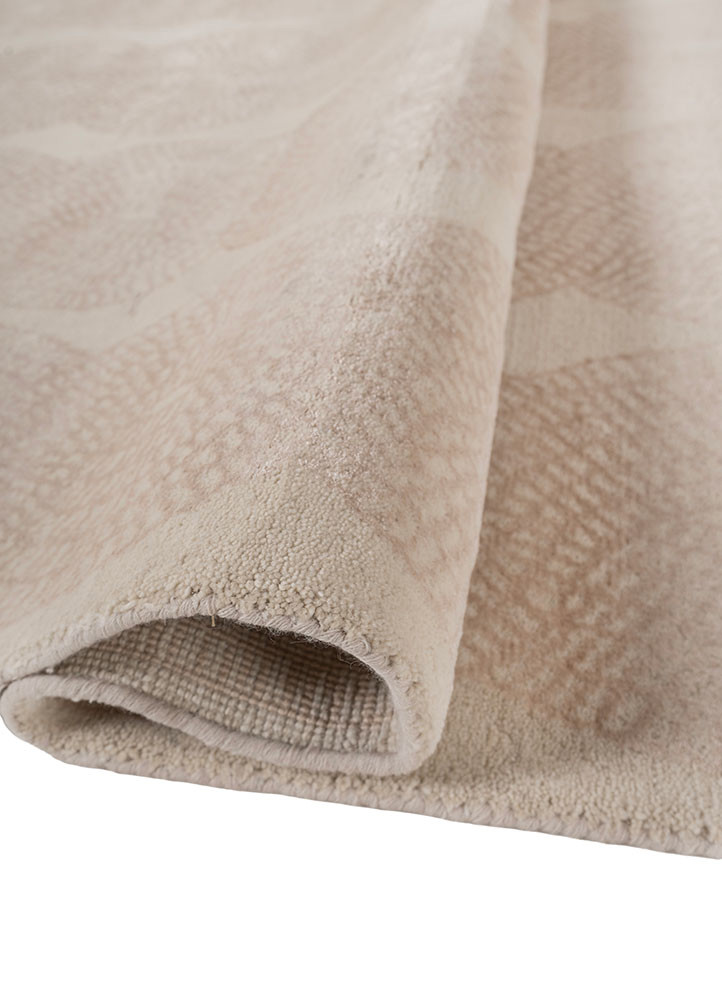 aprezo ivory wool and bamboo silk hand knotted Rug - FoldShot aprezo ivory wool and bamboo silk hand knotted Rug - FoldShot