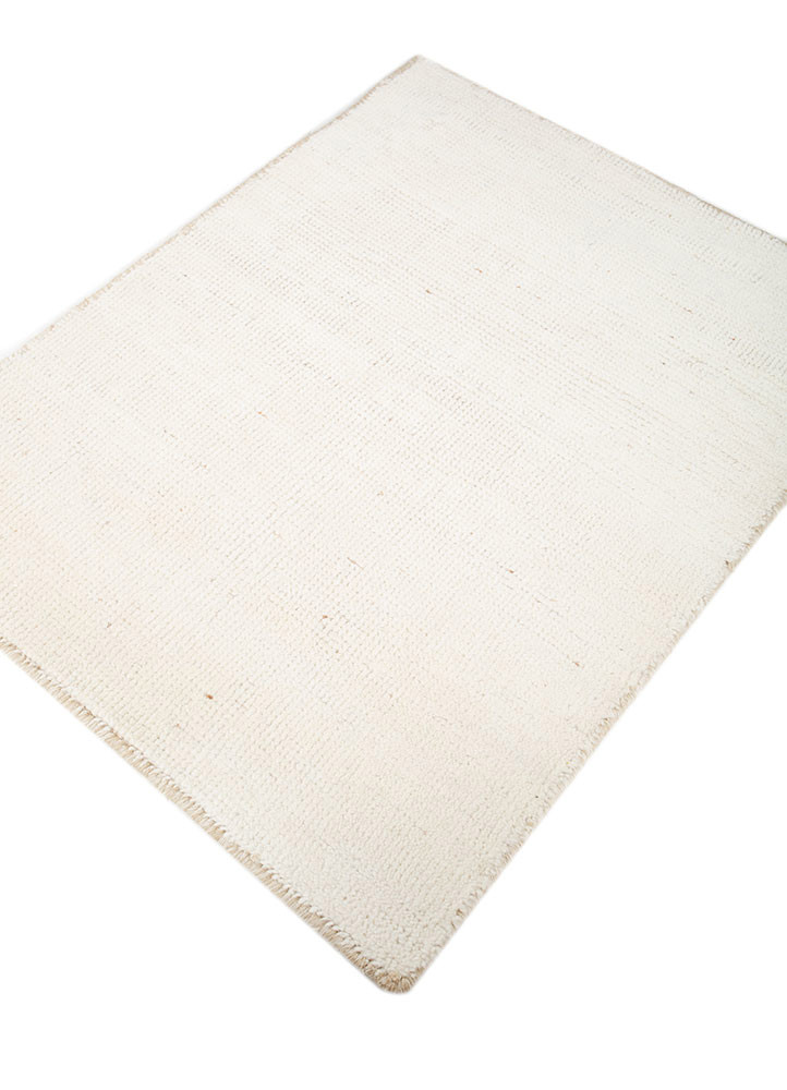 manifest ivory wool hand knotted Rug - FoldShot manifest ivory wool hand knotted Rug - FoldShot