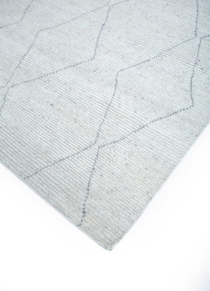 manifest ivory wool hand knotted Rug - FoldShot manifest ivory wool hand knotted Rug - FoldShot