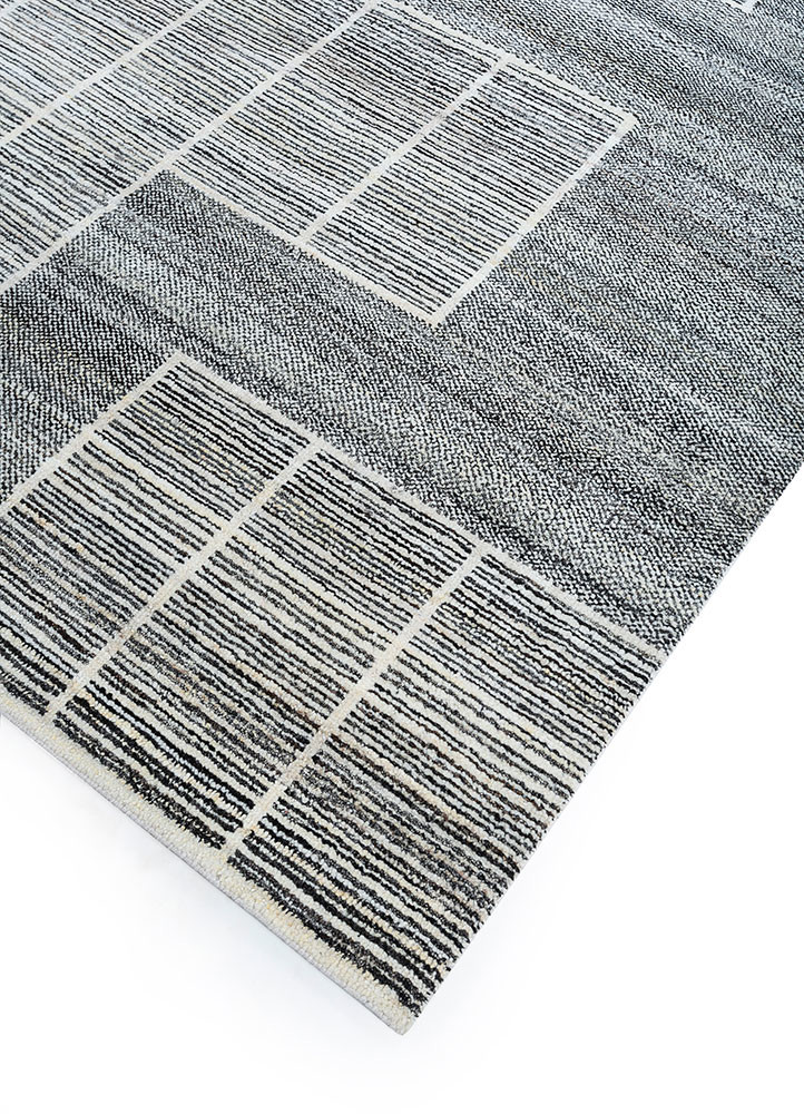 manifest ivory wool hand knotted Rug - FoldShot manifest ivory wool hand knotted Rug - FoldShot