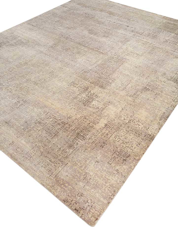uvenuti ivory wool hand knotted Rug - FoldShot uvenuti ivory wool hand knotted Rug - FoldShot