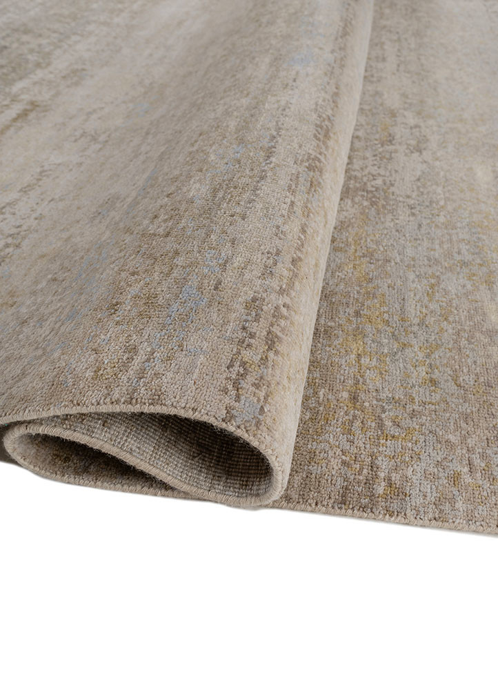 uvenuti ivory wool hand knotted Rug - FoldShot
