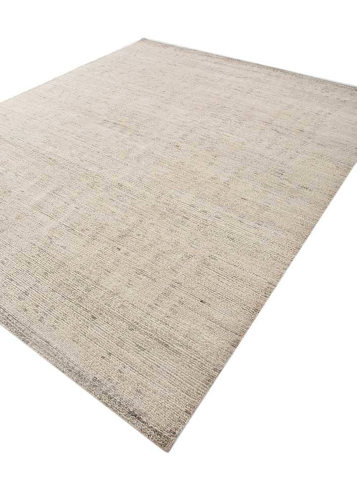 manifest ivory wool hand knotted Rug - FoldShot manifest ivory wool hand knotted Rug - FoldShot