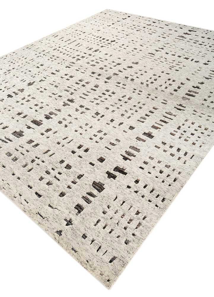 manifest ivory wool hand knotted Rug - FoldShot manifest ivory wool hand knotted Rug - FoldShot