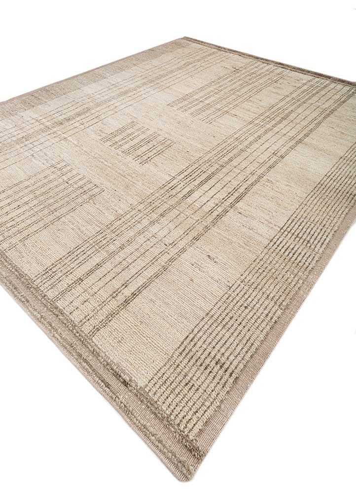 manifest ivory wool hand knotted Rug - FoldShot manifest ivory wool hand knotted Rug - FoldShot