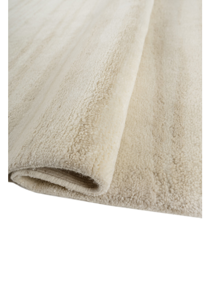aprezo ivory wool hand knotted Rug - FoldShot