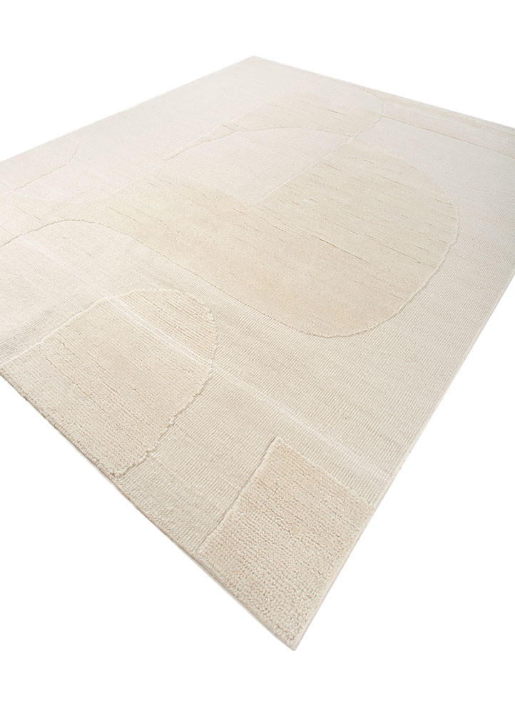 manifest ivory wool hand knotted Rug - FoldShot manifest ivory wool hand knotted Rug - FoldShot