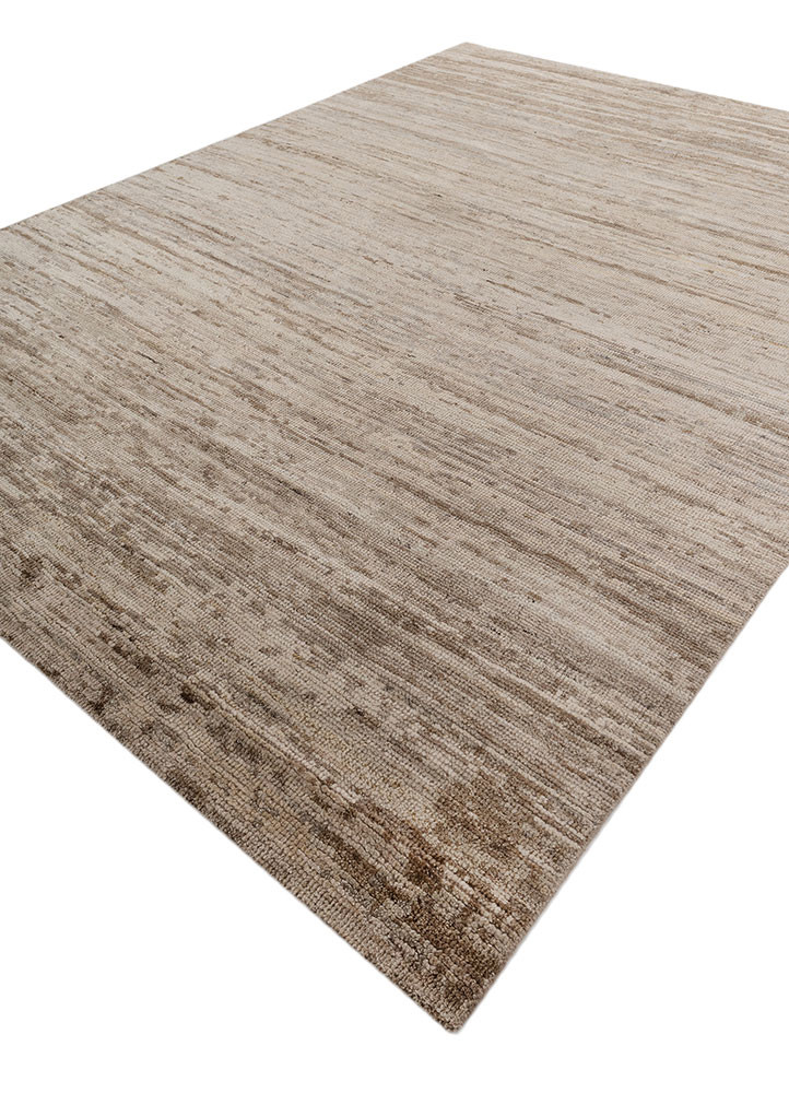 uvenuti ivory wool hand knotted Rug - FoldShot uvenuti ivory wool hand knotted Rug - FoldShot