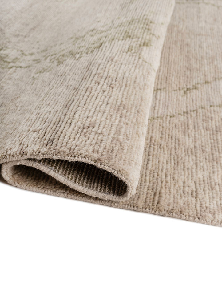 aprezo ivory wool hand knotted Rug - FoldShot aprezo ivory wool hand knotted Rug - FoldShot