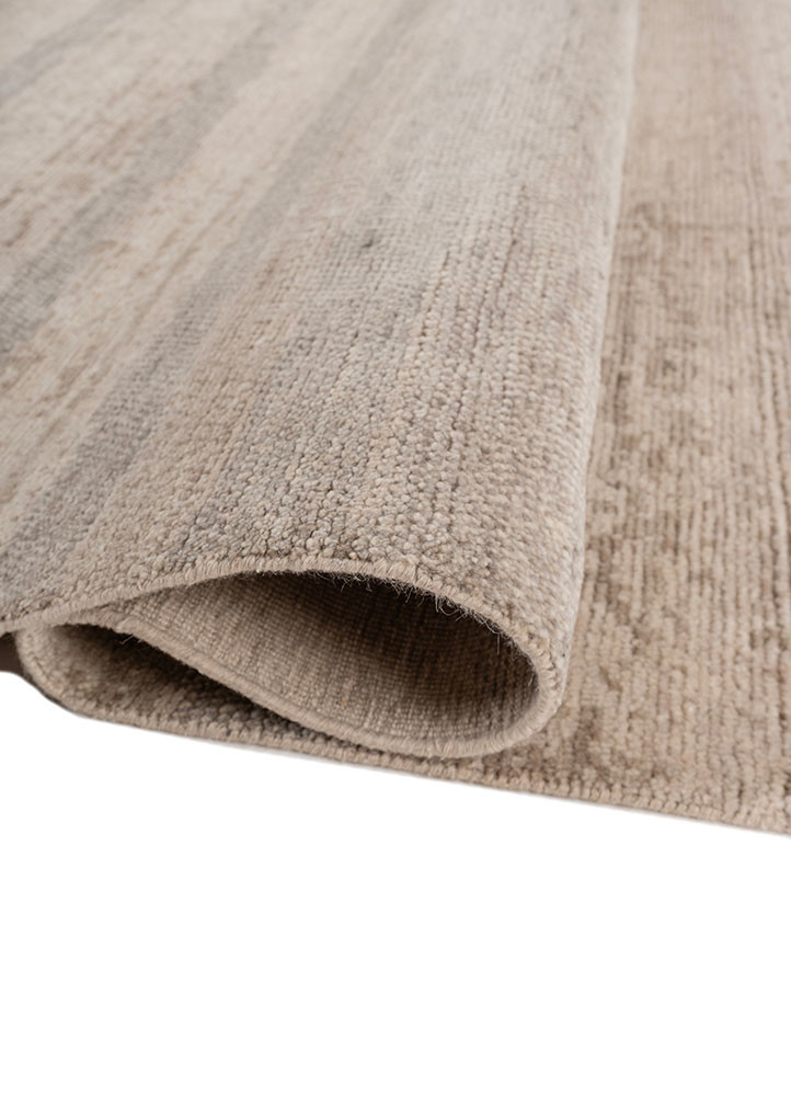 aprezo ivory wool hand knotted Rug - FoldShot aprezo ivory wool hand knotted Rug - FoldShot