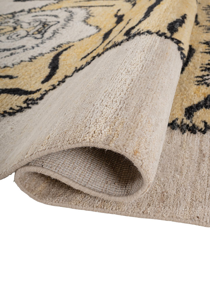 aprezo gold wool hand knotted Rug - FoldShot