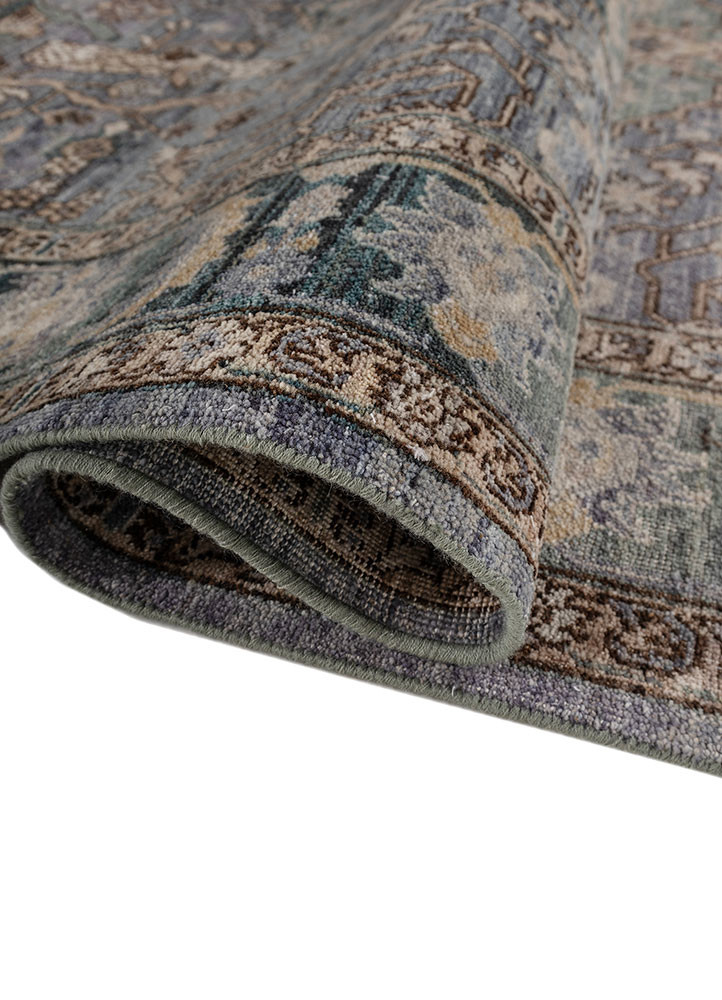 someplace in time blue afghan wool hand knotted Rug - FoldShot someplace in time blue afghan wool hand knotted Rug - FoldShot