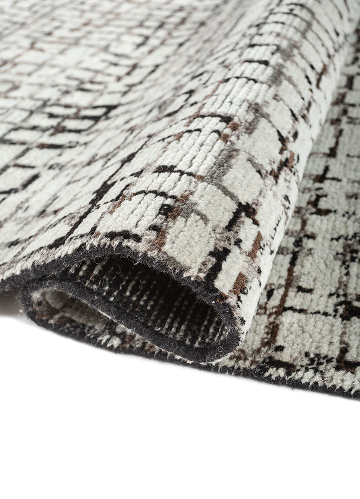 aprezo grey and black wool hand knotted Rug - FoldShot aprezo grey and black wool hand knotted Rug - FoldShot