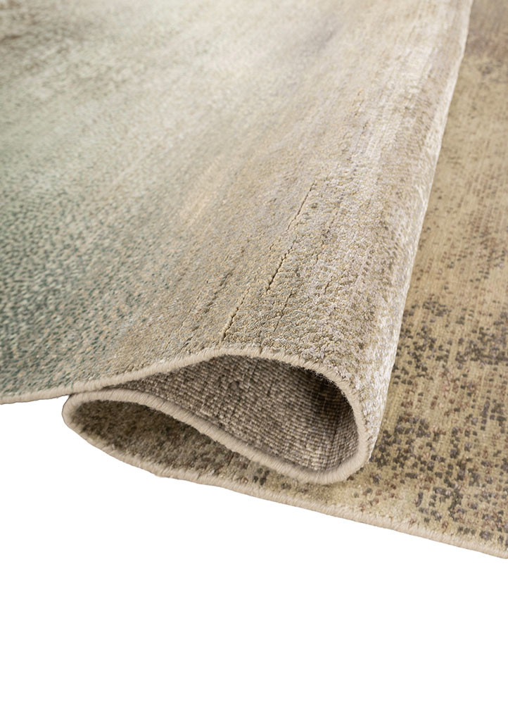 afterglow by kavi blue wool and silk hand knotted Rug - FoldShot afterglow by kavi blue wool and silk hand knotted Rug - FoldShot