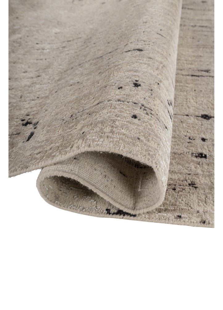 aprezo ivory wool and silk hand knotted Rug - FoldShot aprezo ivory wool and silk hand knotted Rug - FoldShot