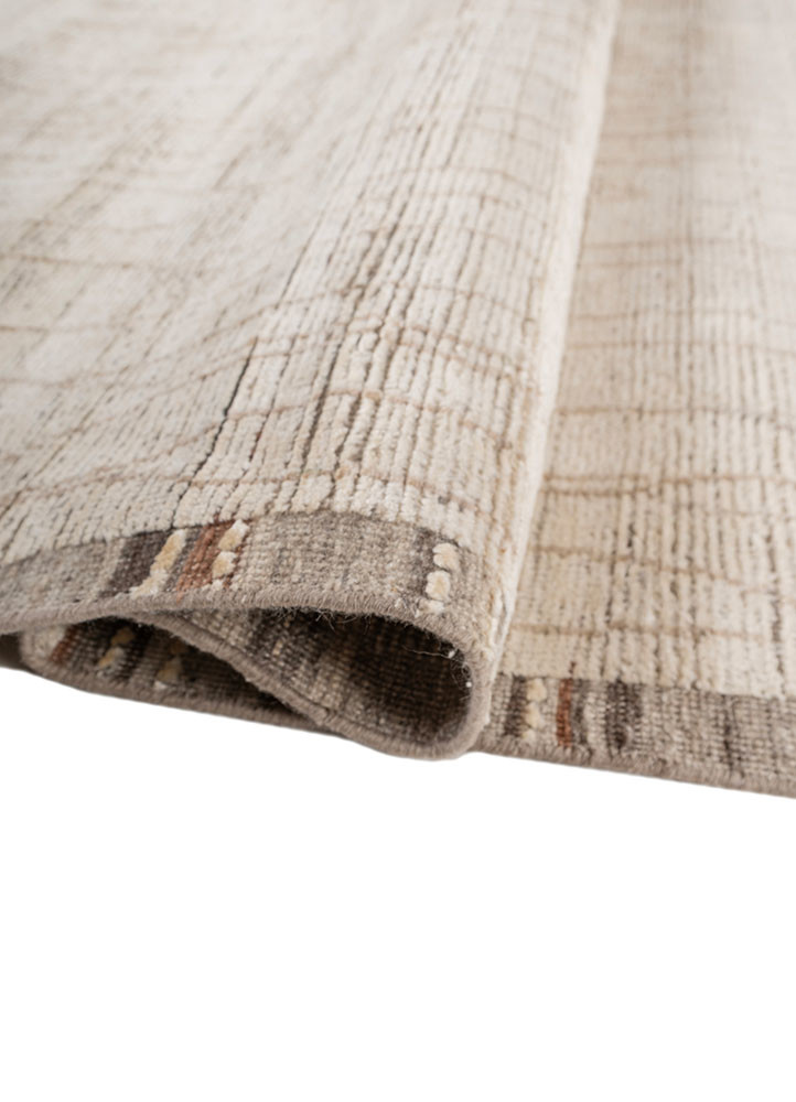 manifest ivory wool and silk hand knotted Rug - FoldShot