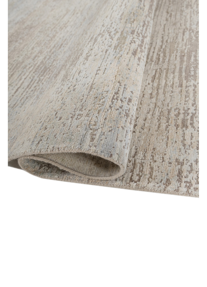 entropy ivory wool and bamboo silk hand knotted Rug - FoldShot entropy ivory wool and bamboo silk hand knotted Rug - FoldShot