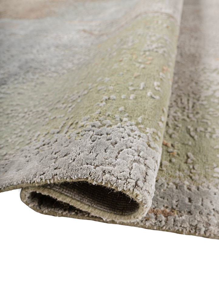 aprezo blue wool and bamboo silk hand knotted Rug - FoldShot aprezo blue wool and bamboo silk hand knotted Rug - FoldShot