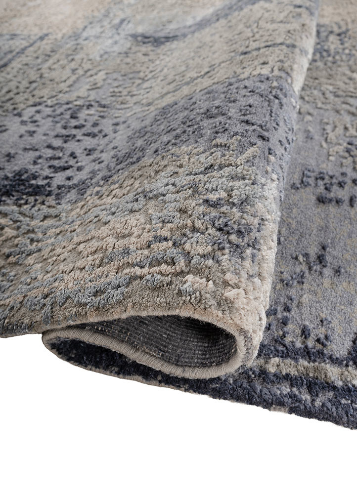 aprezo blue wool and silk hand knotted Rug - FoldShot aprezo blue wool and silk hand knotted Rug - FoldShot