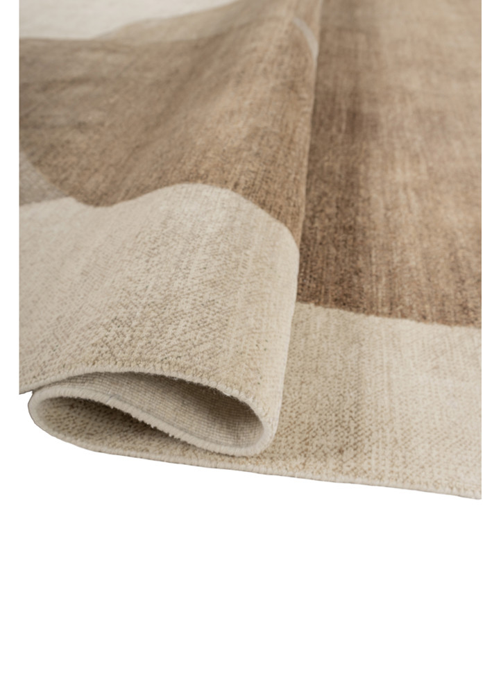 aprezo ivory wool and silk hand knotted Rug - FoldShot aprezo ivory wool and silk hand knotted Rug - FoldShot