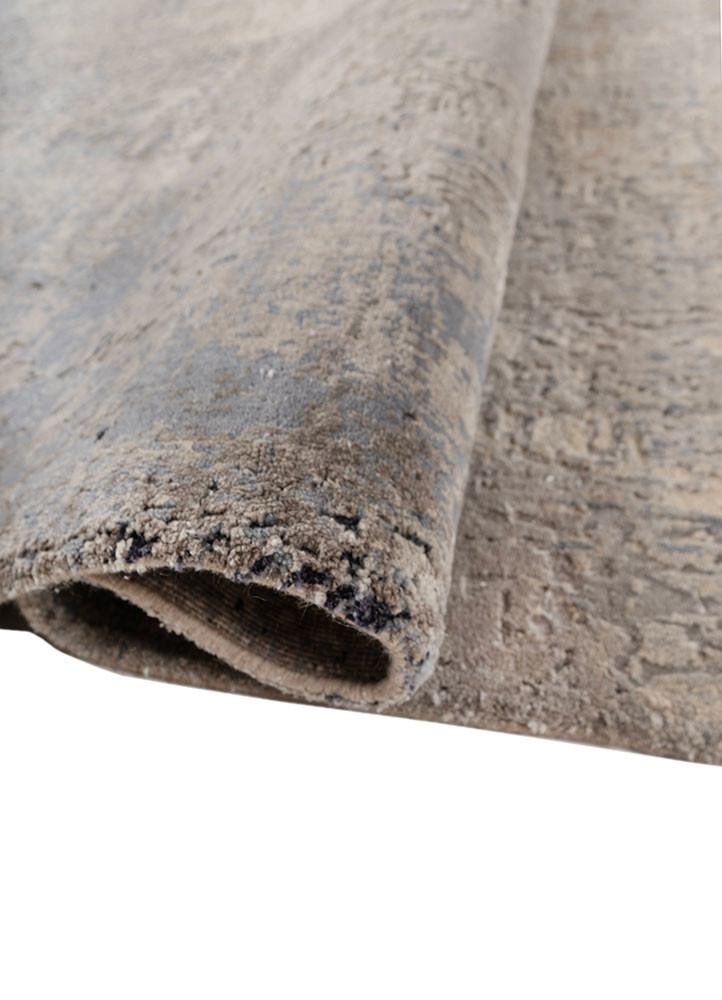 uvenuti ivory wool and silk hand knotted Rug - FoldShot