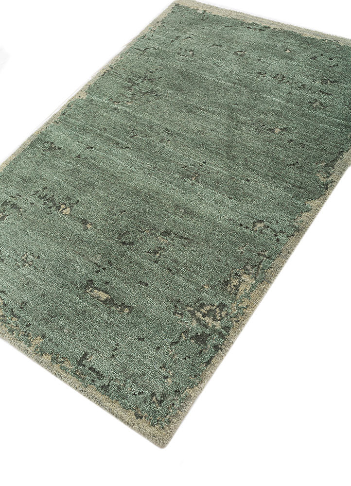 urban pause by kavi green wool hand knotted Rug - FoldShot