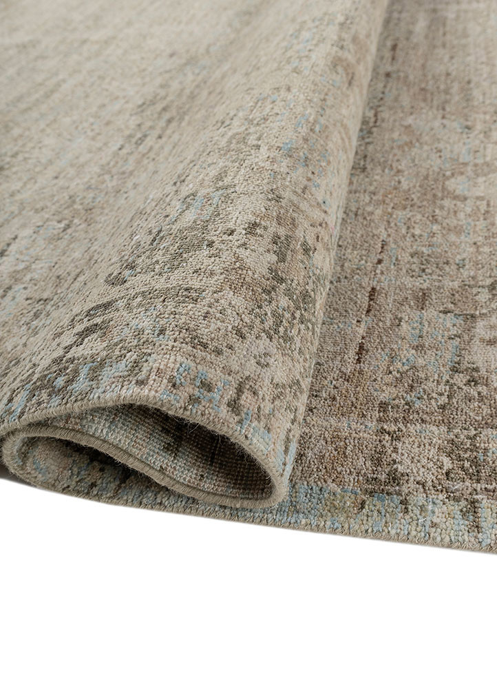 someplace in time green wool hand knotted Rug - FoldShot someplace in time green wool hand knotted Rug - FoldShot