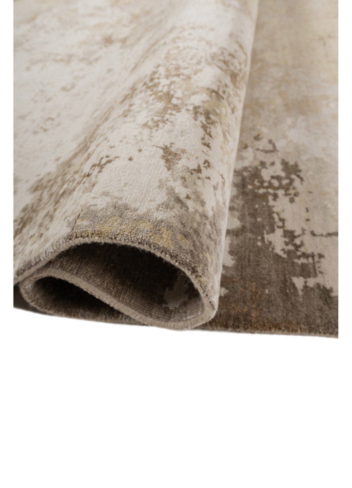 chaos theory by kavi ivory wool and silk hand knotted Rug - FoldShot chaos theory by kavi ivory wool and silk hand knotted Rug - FoldShot