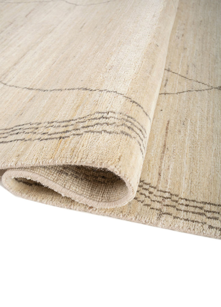 manifest ivory wool hand knotted Rug - FoldShot manifest ivory wool hand knotted Rug - FoldShot