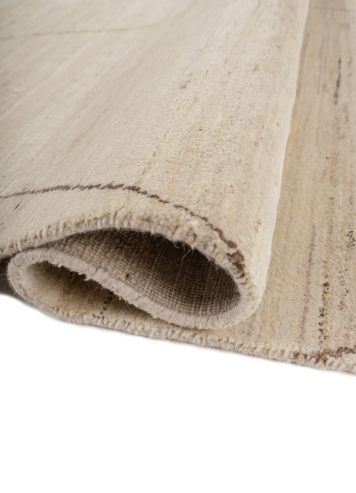 zuri ivory wool hand knotted Rug - FoldShot