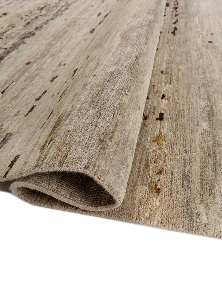 entropy beige and brown afghan wool hand knotted Rug - FoldShot