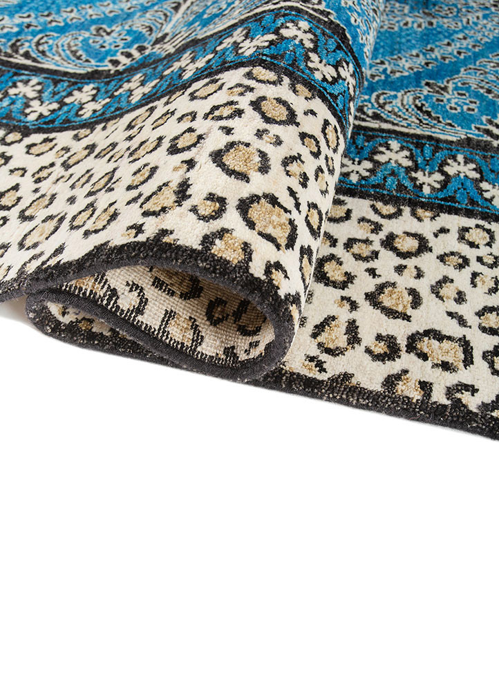 gilded age blue afghan wool hand knotted Rug - FoldShot