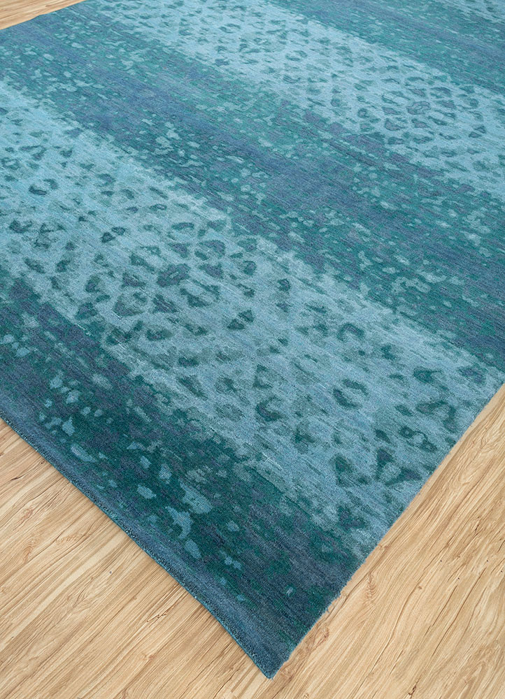 aprezo blue wool hand knotted Rug - FoldShot