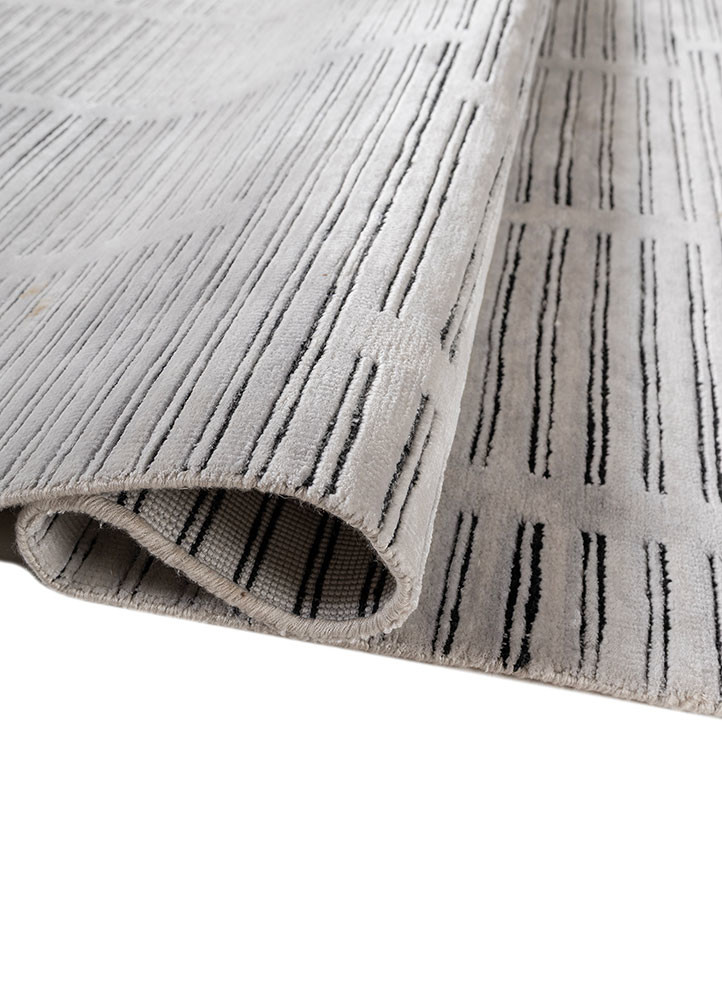 chaos theory by kavi ivory wool and bamboo silk hand knotted Rug - FoldShot