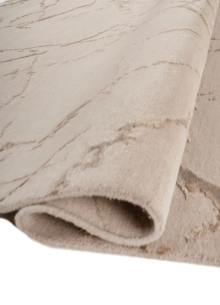 urban pause by kavi ivory wool and bamboo silk hand knotted Rug - FoldShot