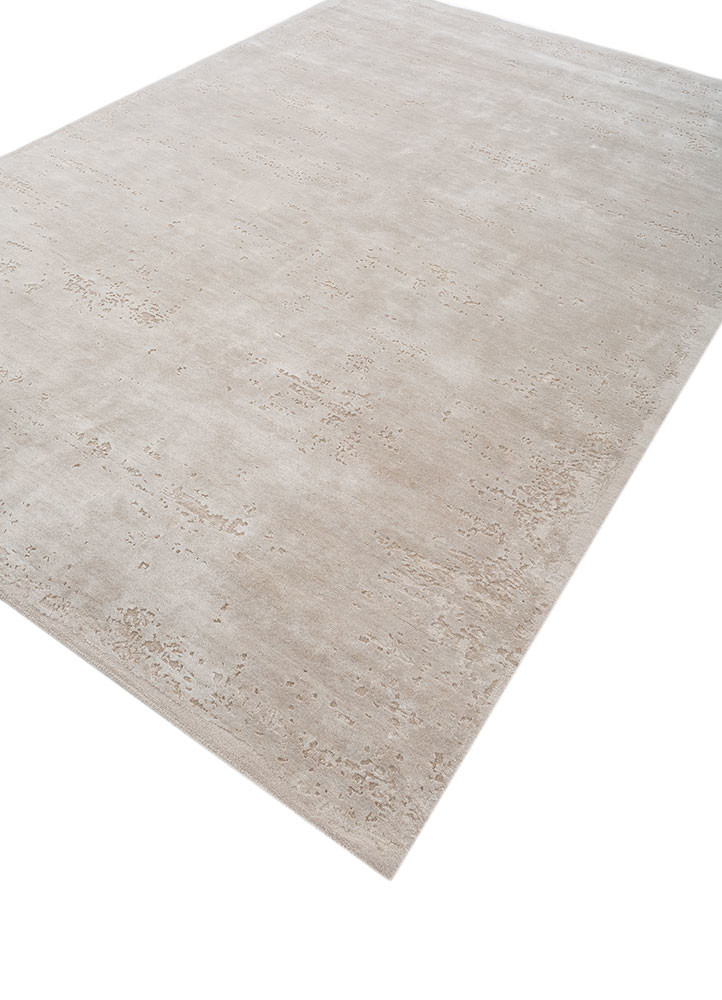 urban pause by kavi ivory wool and bamboo silk hand knotted Rug - FoldShot urban pause by kavi ivory wool and bamboo silk hand knotted Rug - FoldShot