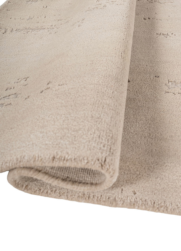 hidden by kavi ivory wool and bamboo silk hand knotted Rug - FoldShot hidden by kavi ivory wool and bamboo silk hand knotted Rug - FoldShot