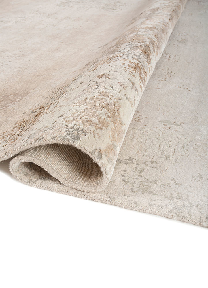 chaos theory by kavi ivory wool and bamboo silk hand knotted Rug - FoldShot chaos theory by kavi ivory wool and bamboo silk hand knotted Rug - FoldShot