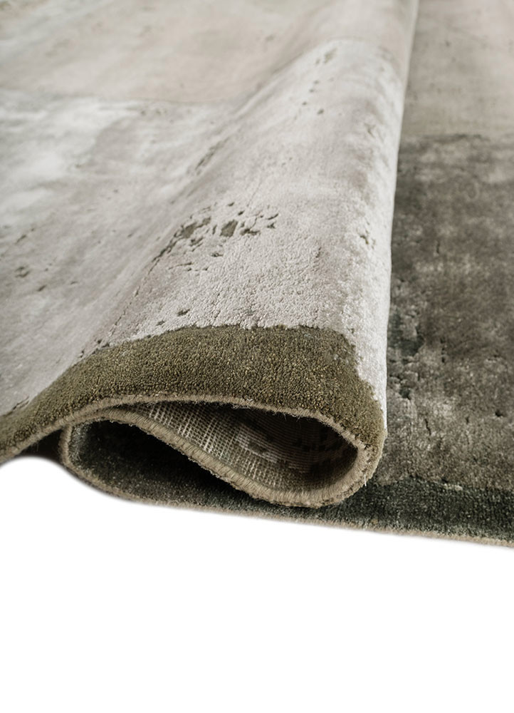 aakar by kavi green wool and bamboo silk hand knotted Rug - FoldShot aakar by kavi green wool and bamboo silk hand knotted Rug - FoldShot