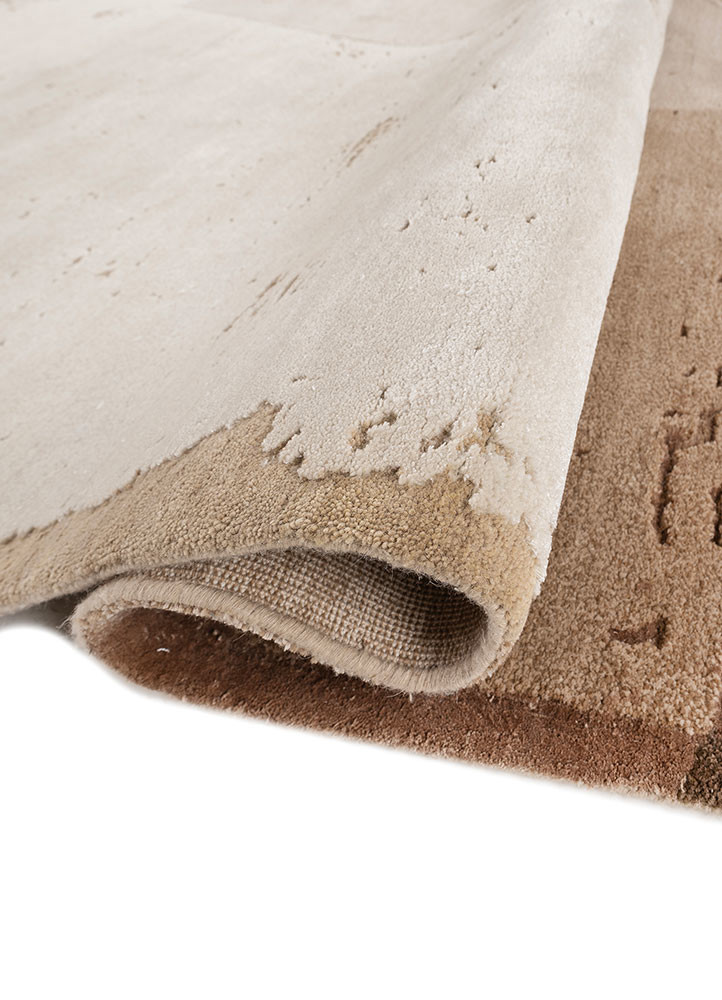 aakar by kavi ivory wool and bamboo silk hand knotted Rug - FoldShot aakar by kavi ivory wool and bamboo silk hand knotted Rug - FoldShot