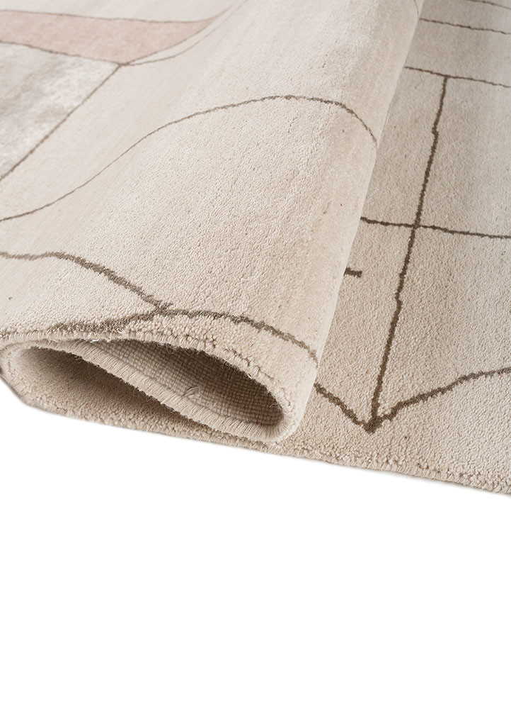 aakar by kavi ivory wool and bamboo silk hand knotted Rug - FoldShot aakar by kavi ivory wool and bamboo silk hand knotted Rug - FoldShot