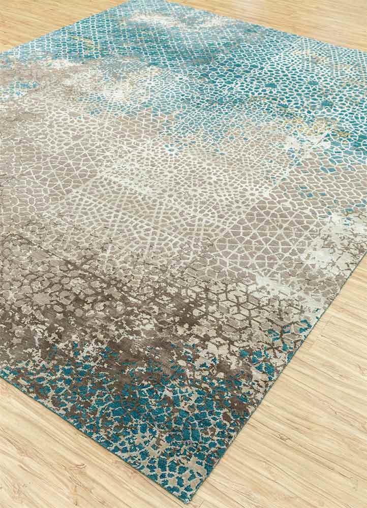 tattvam blue wool and bamboo silk hand knotted Rug - FoldShot tattvam blue wool and bamboo silk hand knotted Rug - FoldShot