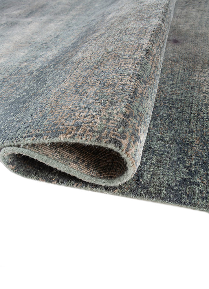 afterglow by kavi blue wool and bamboo silk hand knotted Rug - FoldShot afterglow by kavi blue wool and bamboo silk hand knotted Rug - FoldShot