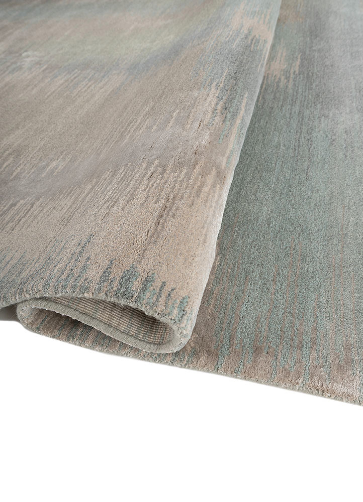 afterglow by kavi ivory wool and bamboo silk hand knotted Rug - FoldShot afterglow by kavi ivory wool and bamboo silk hand knotted Rug - FoldShot