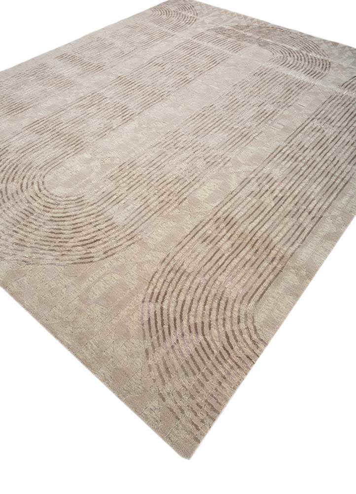 aakar by kavi ivory wool and bamboo silk hand knotted Rug - FoldShot aakar by kavi ivory wool and bamboo silk hand knotted Rug - FoldShot