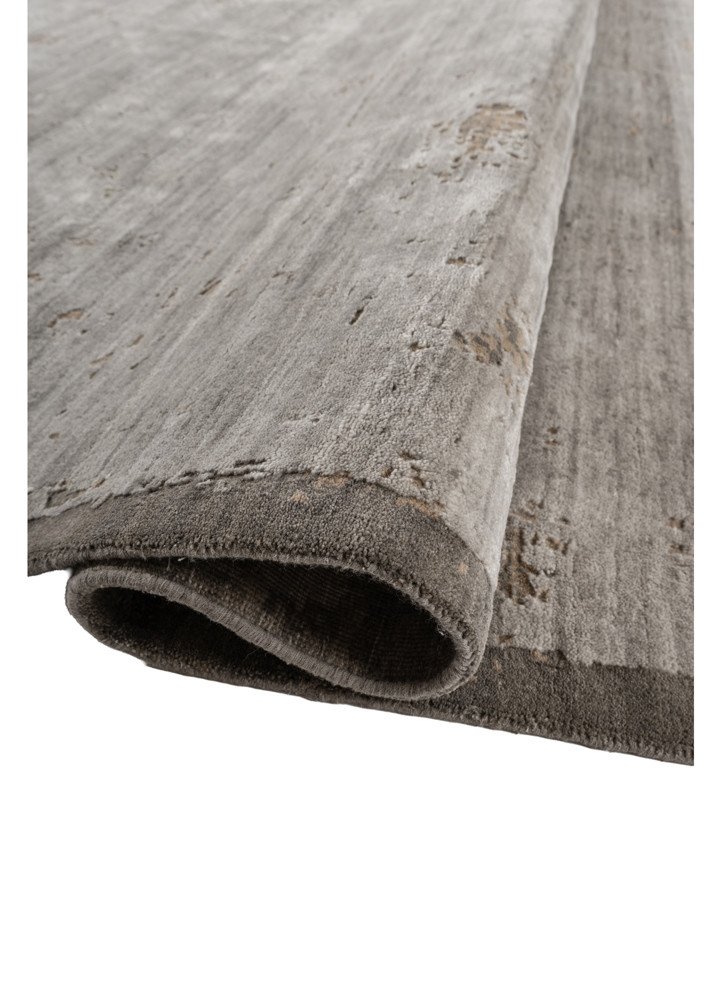 aprezo grey and black tencil hand knotted Rug - FoldShot aprezo grey and black tencil hand knotted Rug - FoldShot