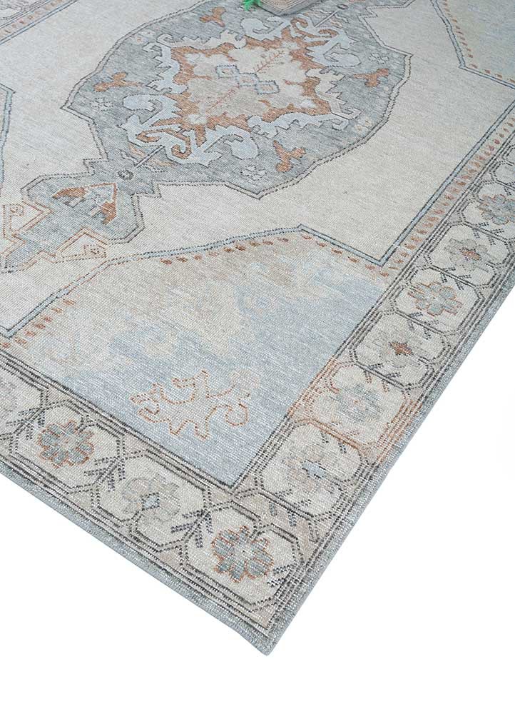 erbe ivory wool hand knotted Rug - FoldShot